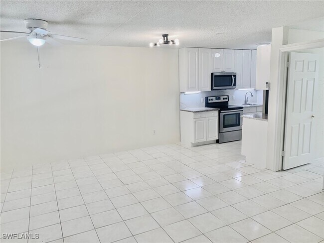 Photo - 826 Wiggins Pass Rd Unit 214