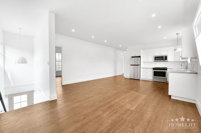 Spacious Executive 3-Bedroom Suite with Private Yard & Utilities Included
