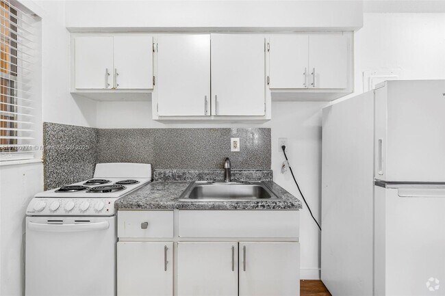 Building Photo - 1235 W 66th St Unit 16 Rental