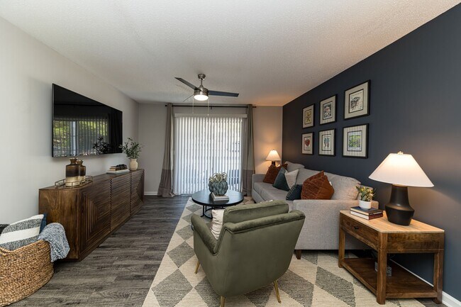 Spacious living room with hardwood-style flooring