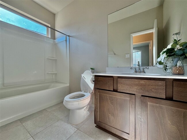 Photo - 8711 Windsong Trail Dr