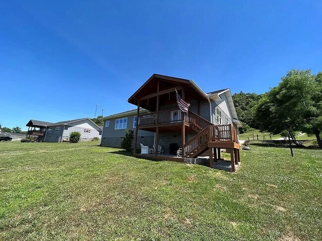 Photo - Stunning 3-Bedroom Home with Deck, Patio & Large Yard in Kodak, TN