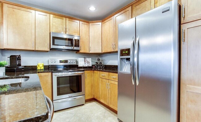 Kitchen with Stainless Steel Appliances and Soft Closing Cabinetry