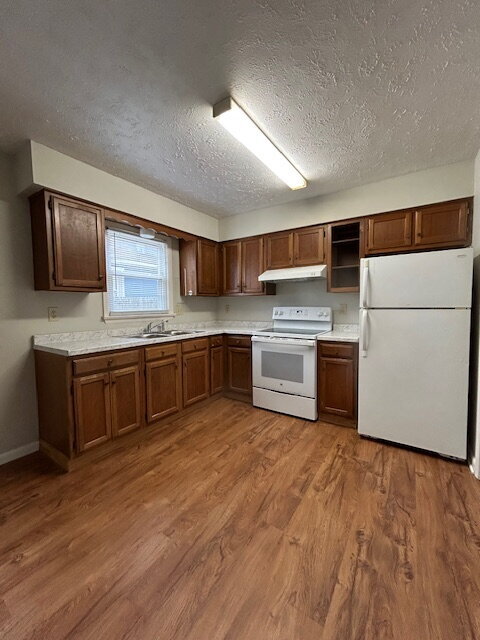 Photo - 1/2 Off First Month's Rent with move-in by December 19th, 2025

"Charming 2-Bed Oasis in Front Ro...