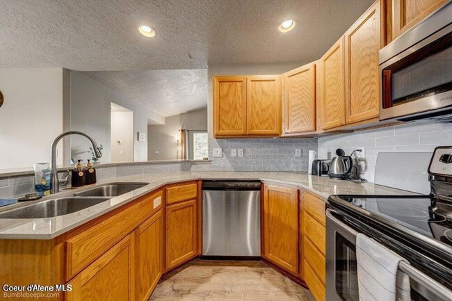 Photo - Beautiful Updated 3 Bedroom Condo with A/C, Garage & Fireplace in Forsythia Place!