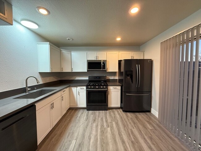 Photo - Updated 3-Bedroom Townhome in Gated Community with Pool Access