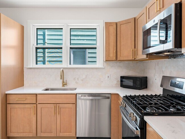 Photo - Beautifully Renovated 4-Bedroom Home with Designer Kitchen, Updated Bath & Central Air – Availabl...