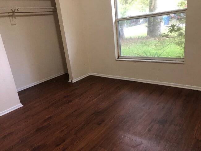 Photo - SPACIOUS 3BR/1.5BA w/Carport, Beautiful Wood Finish Flooring, Privacy Fenced Backyard! NO APP FEE!