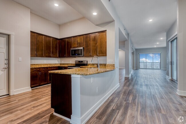 Gourmet kitchen featuring a breakfast bar - Windsor on the Lake Rental