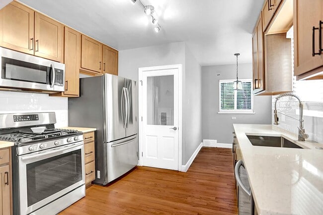 Elegant Sunnyside home with covered patio by Rocky Mtn Lake Park