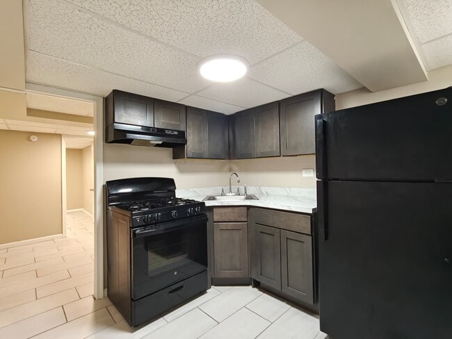 Building Photo - 6766 Blakemore St Unit C1