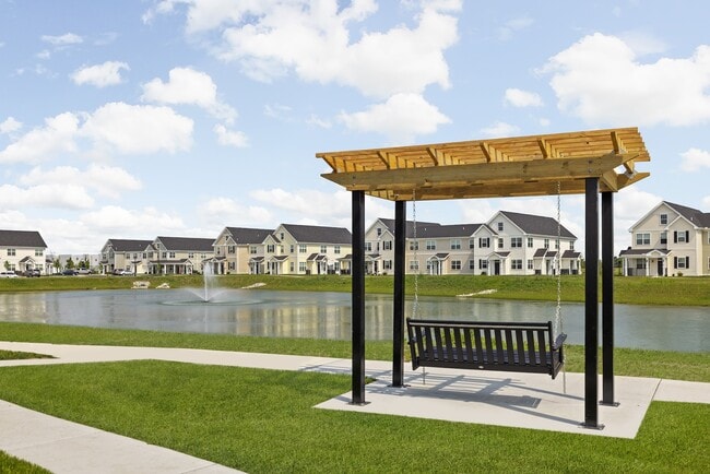 Stroll around the lake or sit a while - Hickory Cottages