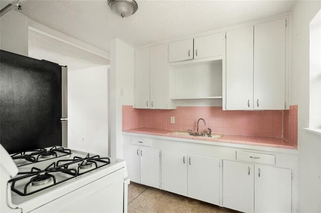 918 E 50th None