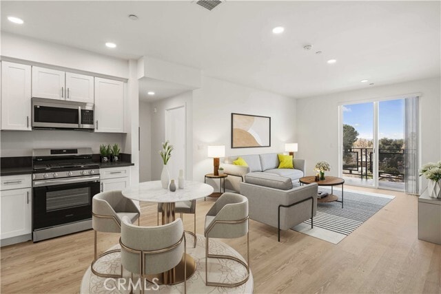Photo - 11714 Archwood St Unit 207