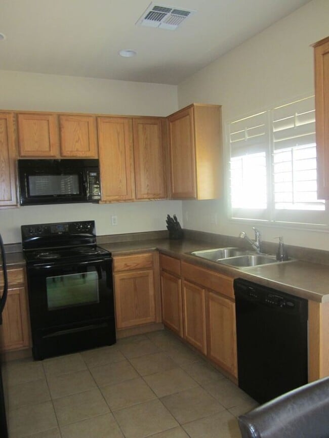 Photo - Adorable 2 story patio style with three spacious bedrooms and two full baths upstairs