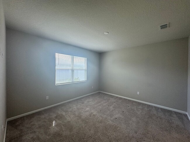 Photo - Where Modern Comfort Meets 4BD/3BA Hometown Charm — Your Story Begins in Okahumpka! FULLY-FENCED!...