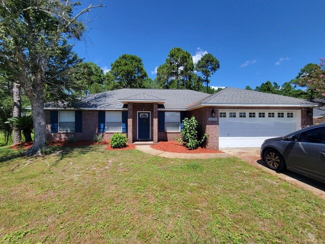 Building Photo - 7636 Manatee St Rental
