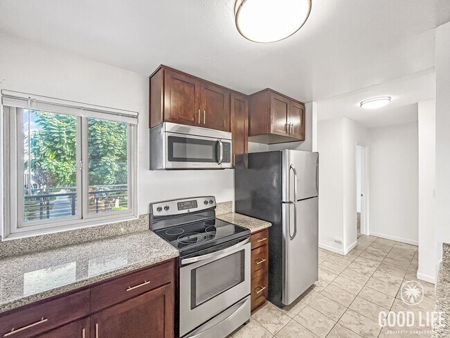 Photo - Bright 2BR Condo with New Carpet, Private Balcony & Great Amenities in Clairemont Mesa! Unit L