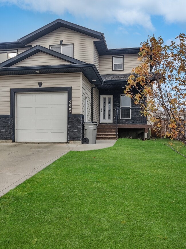 Building Photo - 9062-9131 131 Ave