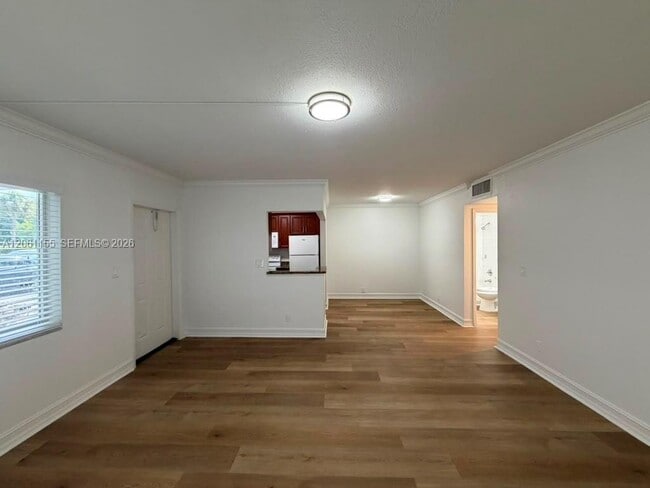 Building Photo - 1400 NE 56th St Unit 106