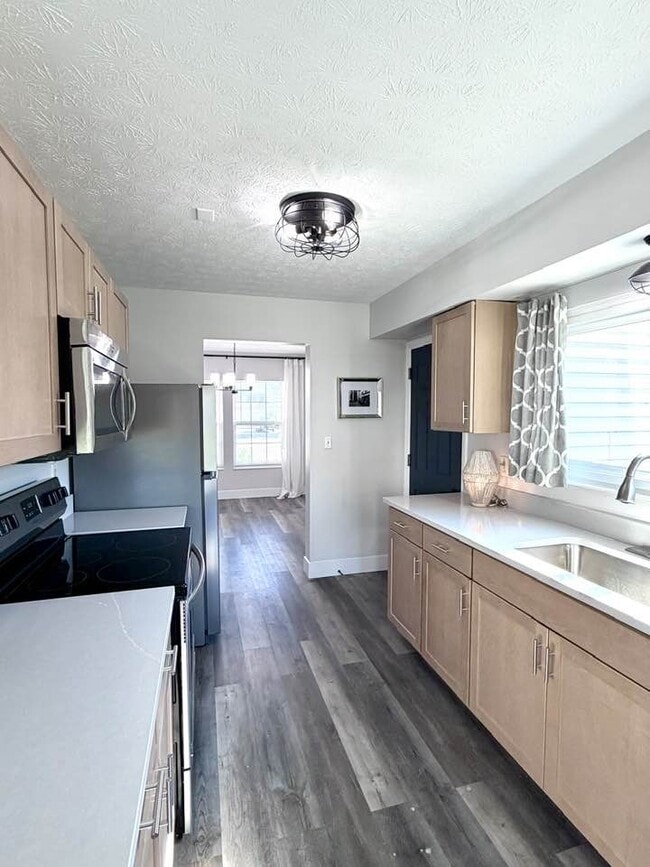 Kitchen looking toward the formal dining room - 1200 Bugle Bluff Ct