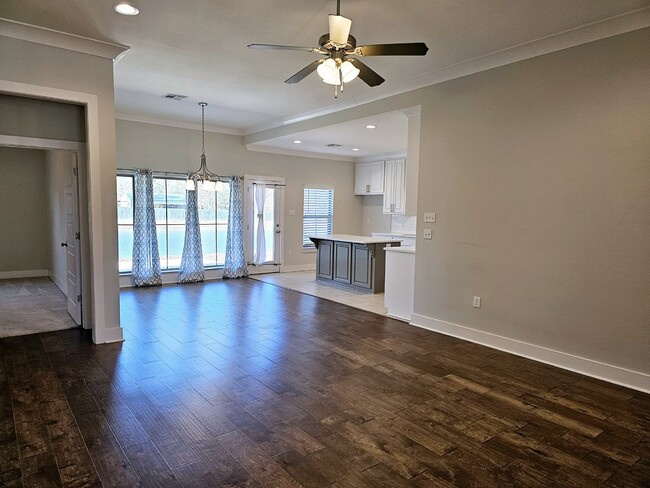 Photo - Stunning 4-Bedroom Waterfront Home with Granite Countertops and Hardwood Floors in The Sanctuary ...