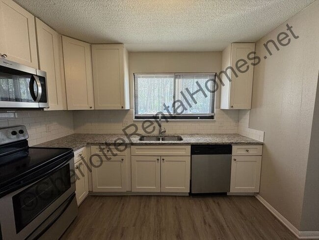 Photo - House in Mint Hill with deck out back