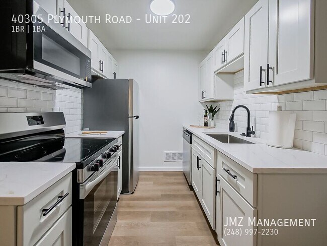 Building Photo - 40305 Plymouth Rd Unit 202