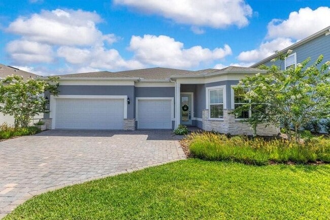 Building Photo - Waterfront Luxury in Isles of Lake Nona | 3-Car Garage, Resort Amenities & HOA-Included Cable, In...