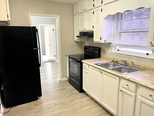 Photo - Welcome to this charming 4 bedroom, 2 bath...