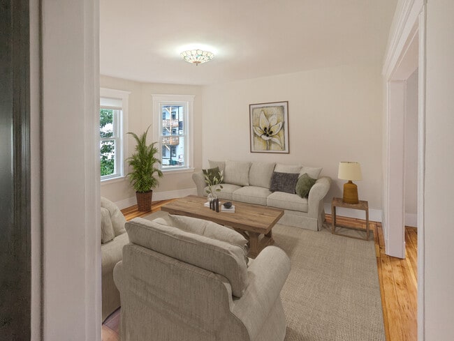 Living room with bay windows - 22 Reed St Unit 2