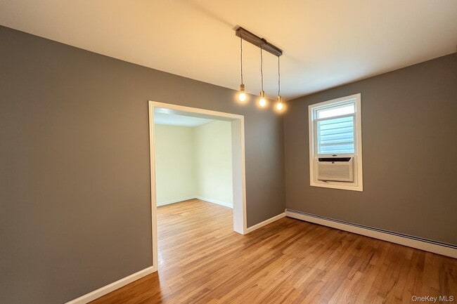Building Photo - 61-20 55th Dr Rental