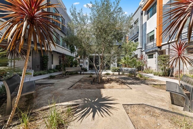 Gated community space with community room. - 215 Elm Ave