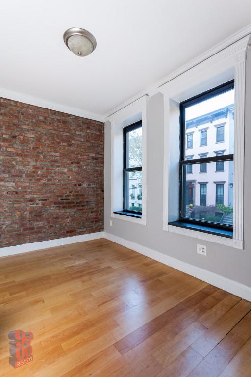 Building Photo - 340 E 18th St Unit 2C Rental