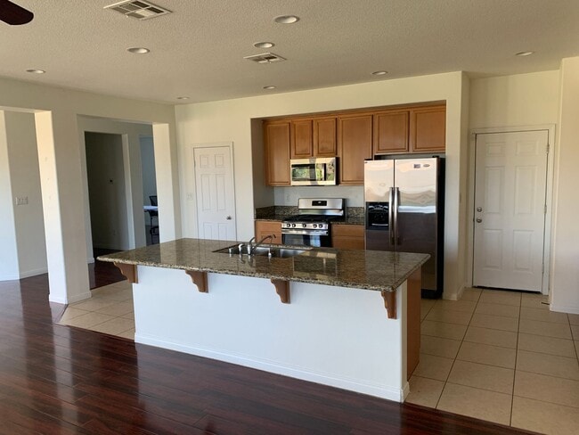 Photo - 4 Bedroom Home with Paid Solar, 3-Car Garage & Large Backyard