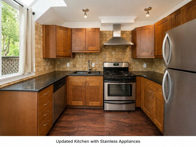 Photo - Rare Virginia Highland Loft-Style Retreat with Private Patio, Off-Street Parking, and Serious Cha... Unit A