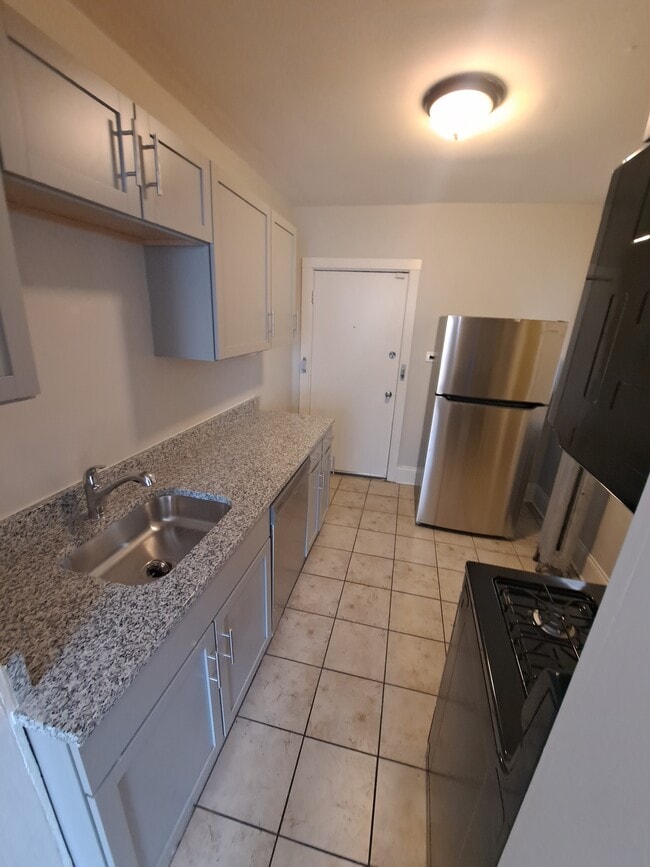 Photo - 7526-36 S Colfax Ave