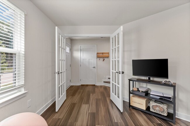 Photo - Luxurious three-story townhome with owner's suite and high-end finishes