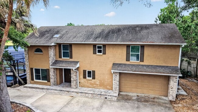 Photo - Available Now! Waterfront Living at Its Best – Pool, Decks & Gated Privacy