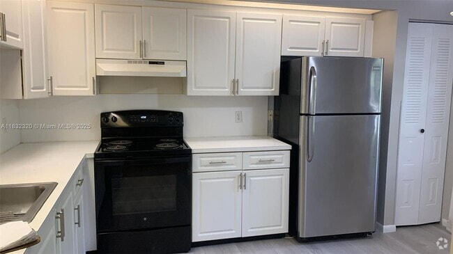 Building Photo - 12850 SW 4th Ct Unit 206I Rental