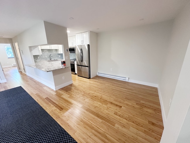 Photo - Stylish Corner Unit in Prime Needham Locat...