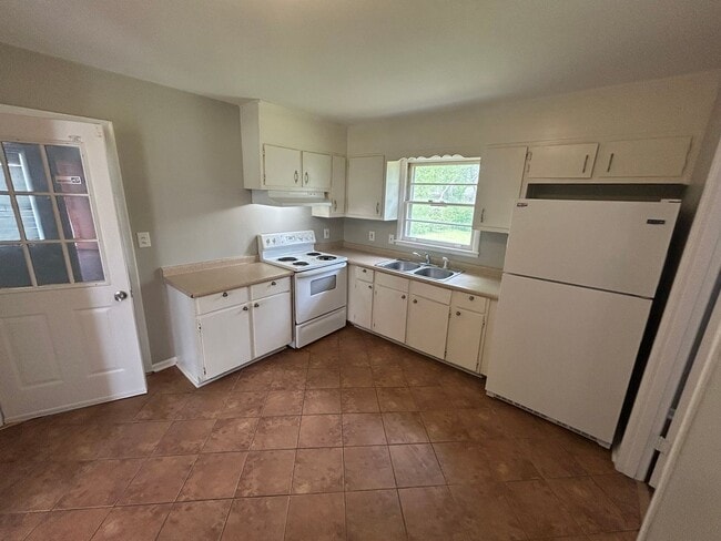 Photo - 3 Bedroom Brick Home with Hardwood Floors, Garage & Large Backyard