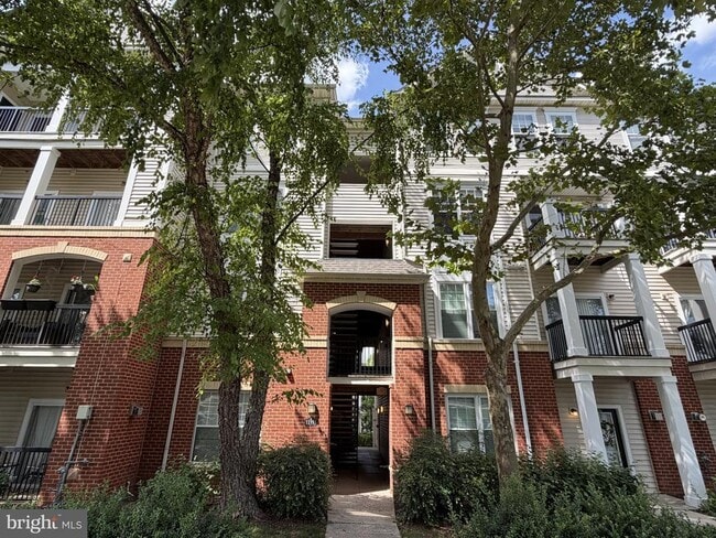 Building Photo - 11353 Aristotle Dr Unit 8-305