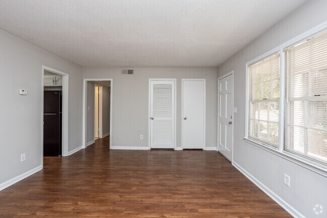 2BR, 1BA - 1,200SF - Living Room - The Cove