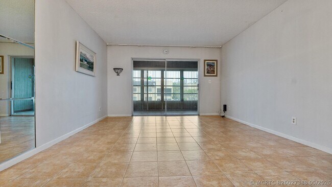 Building Photo - 5890 NW 64th Ave Unit 308