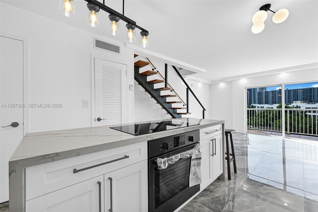 Building Photo - 17800 Atlantic Blvd Unit PH8