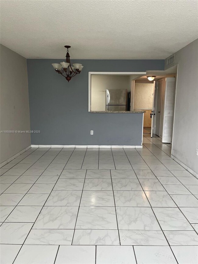 Building Photo - 5775 W 20th Ave Unit 210 Rental