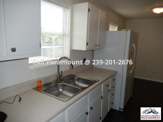 Photo - Won't Last Long! Unique Lehigh Home with Fenced Yard