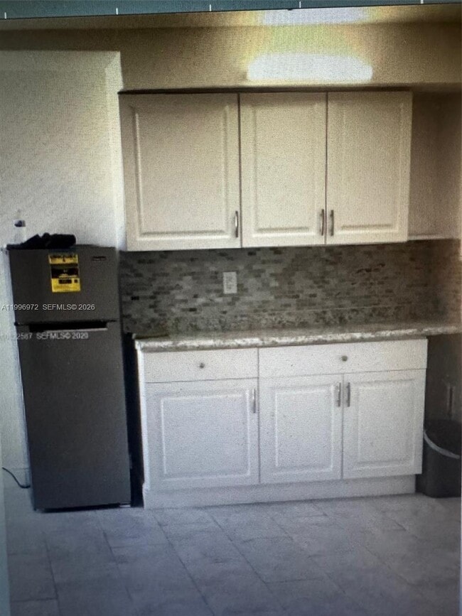 Building Photo - 1625 NW 9th Ave Unit A