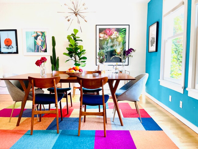 High ceilings & large windows as well as skylight + recessed lighting & a mid-century chandelier - 328 Harriet St